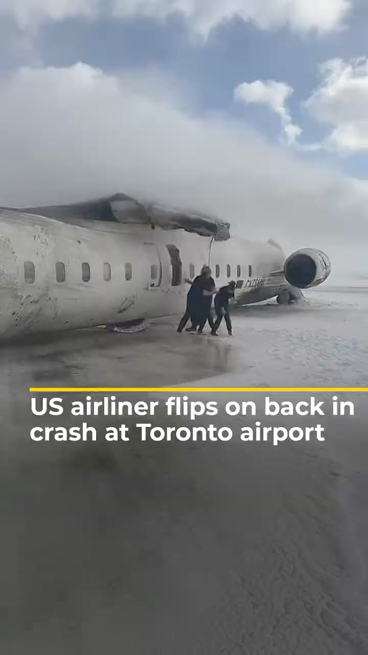 US airliner flips on back in crash landing at Toronto airport | AJ #shorts